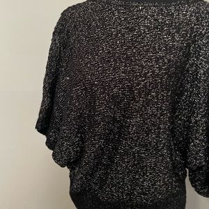 Black pullover sweater.  3/4 sleeves